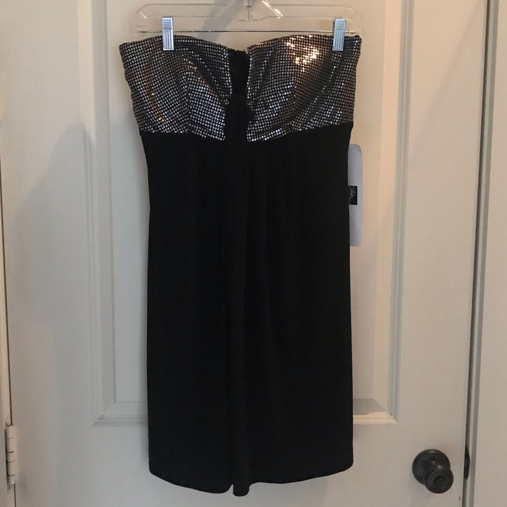 Calvin Klein black, strapless short dress.